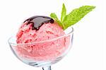 Delicious raspberries ice cream with syrup in glass. Shallow depth of field