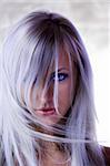 fashion portrait with  forced colors of cute blond girl with long hair