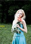 Young Female With Roses In Hands