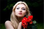 Pretty Blonde Woman With Brown Eyes. Close-Up Portrait