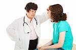Female doctor feels the forehead of her teenage patient.  Isolated on white.