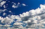 White clouds over blue sky - a great background image for many uses