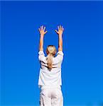 Young woman doing exercises outdoors