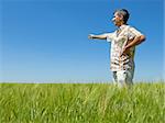 a man is holding his hand pointing the harvest