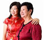 Asian Chinese Mother & Daughter looking away.