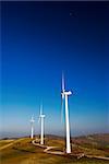 Three modern and ecologic generators on top of a hill