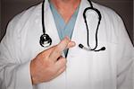 Male Doctor Abstract with Stethoscope Crossing Fingers.