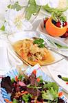 Delicious vegetarian menu - cabbage soup with mixed salad and fresh fruits