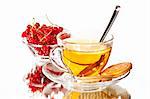 drink series: glass cup of tea with red currants