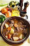 Freshly baked beef stew with olive oil and fresh vegetables.