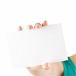 Woman holding a blank note card / white sign