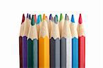 Assortment of coloured pencils isolated on white background. Shallow depth of field