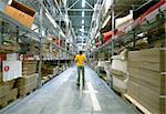 man  in big storehouse photo