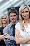 Portrait of a beautiful businesswoman in front of her team