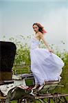 beautiful bride and an old  carriage / retro style