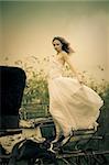 beautiful bride and old  carriage / retro style split toned