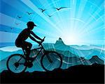 Biker Silhouette  with mountains and sunrise in the background