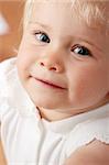 Blond caucasian baby girl portrait