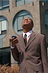 An confident and successful African-American businessman in a power suit