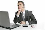 Businessman with headphones and laptop on help center