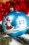 Blue Christmas bauble with ornament of Santa Claus