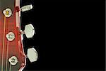Guitar head. Close up. Isolated on black background with clipping path.