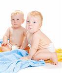 Two baby boys, isolated, over white