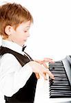 Little pianist making his first steps in music