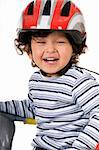 The child in a protective helmet