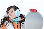 Laughing beautiful girl snowboarder