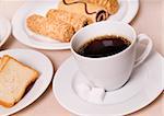 cup with cafe and biscuits