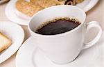 Cup with cafe and biscuits