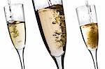 Champagne glass with bubbling champagne flowing in