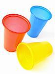 three plastic empty colorful cups