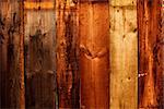 Fragment of an abstract wooden wall close up