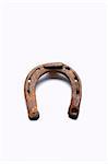 old rusty horseshoe isolated on white background - clipping path