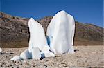 Two mysterious iceberg pillars in a dried out lake. A rare sight!