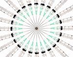 Stock image of symmetrically arranged syringes on a circle, isolated on white