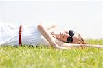 women lie down on grass,Outdoor at park