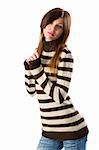 studio shot portrait of young cute and sweet brunette wearing a brown and white sweater