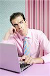 Businessman young thinking on laptop, wallpaper colorful background