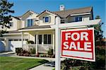 Home For Sale Sign in Front of New House.