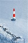 A photography of the beautiful lighthouse at Beachy Head