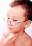 Children lookin at floor thinking over white background