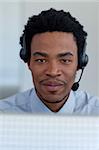 Portrait of Afro-American businessman working in a call center