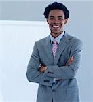 Confident and smiling Afro-American businessman in a presentation