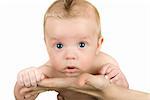 Little baby boy taken closeup isolated on white background