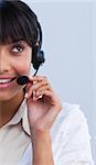 Portrait of a beautiful ethnic young businesswoman working in a call center