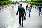 Wedding walk in the park in a sunny summer day