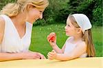 Young mother and daughter having Easter time